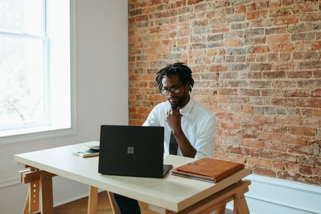 man working on laptop